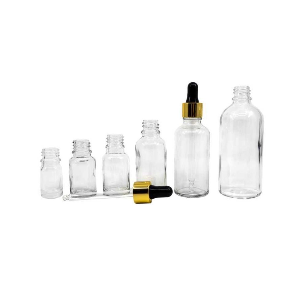 Staklena boca transparentna sa zlatno-crnom pipetom